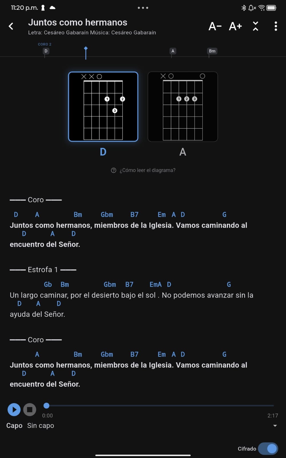 Corus mostrando diagramas de posición de acordes de guitarra sobre la letra
